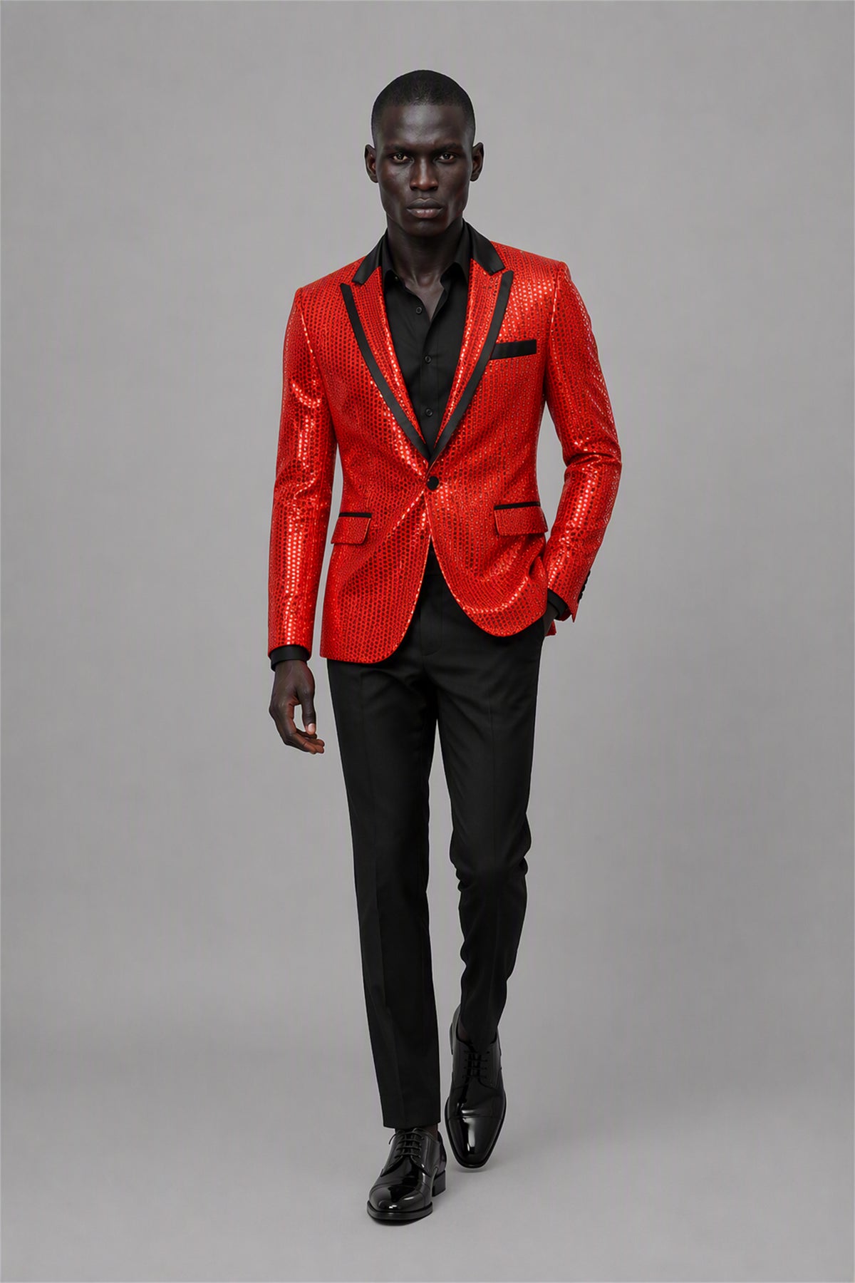 Savile Red Sequin Tuxedo Jacket – Full side profile rear view showing slim silhouette, red sequin texture and black satin lapel profile