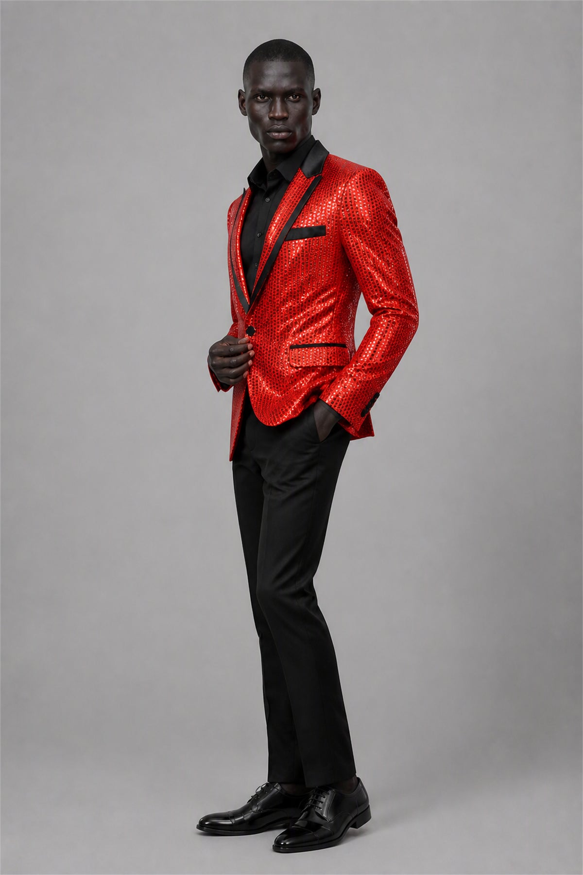 Savile Red Sequin Tuxedo Jacket – Full rear three-quarter side view showing red sequin jacket back construction and black satin lapel edge