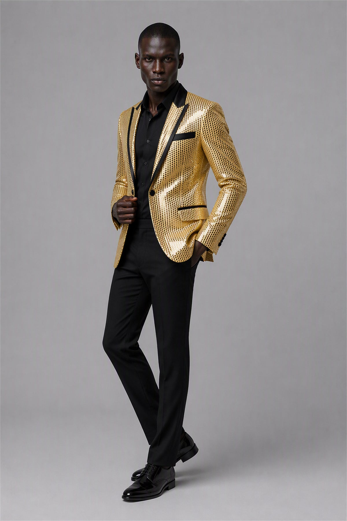 Savile Gold Sequin Tuxedo Jacket – Full rear three-quarter side view showing gold sequin jacket back construction and black satin lapel edge