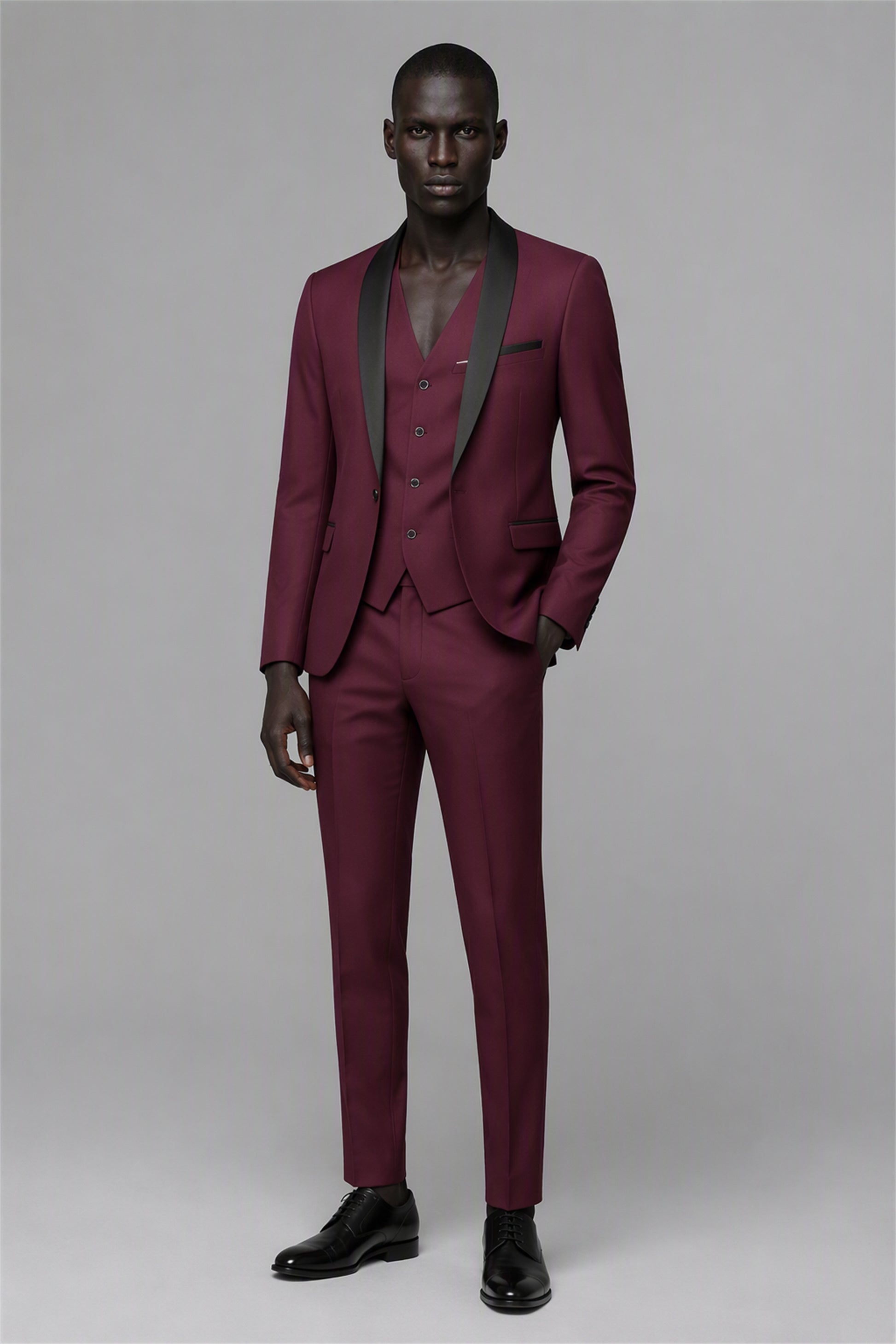 Savile Burgundy 3-Piece Tuxedo Set – Upper-body front close-up showing deep burgundy wool-blend jacket, black satin shawl lapel, burgundy vest with black buttons and black shirt
