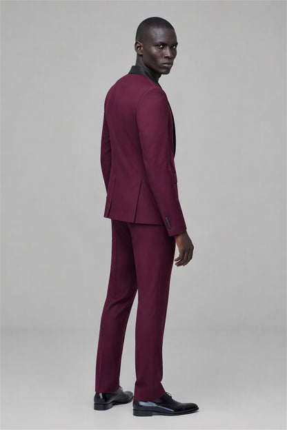 Savile Burgundy 3-Piece Tuxedo Set – Full front standing view, hand in pocket showing complete 3-piece silhouette with jacket, vest and tapered trousers