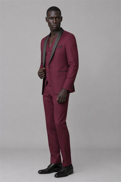 Savile Burgundy 3-Piece Tuxedo Set – Full rear three-quarter view showing burgundy jacket back construction, black satin shawl lapel edge and tapered trouser fit