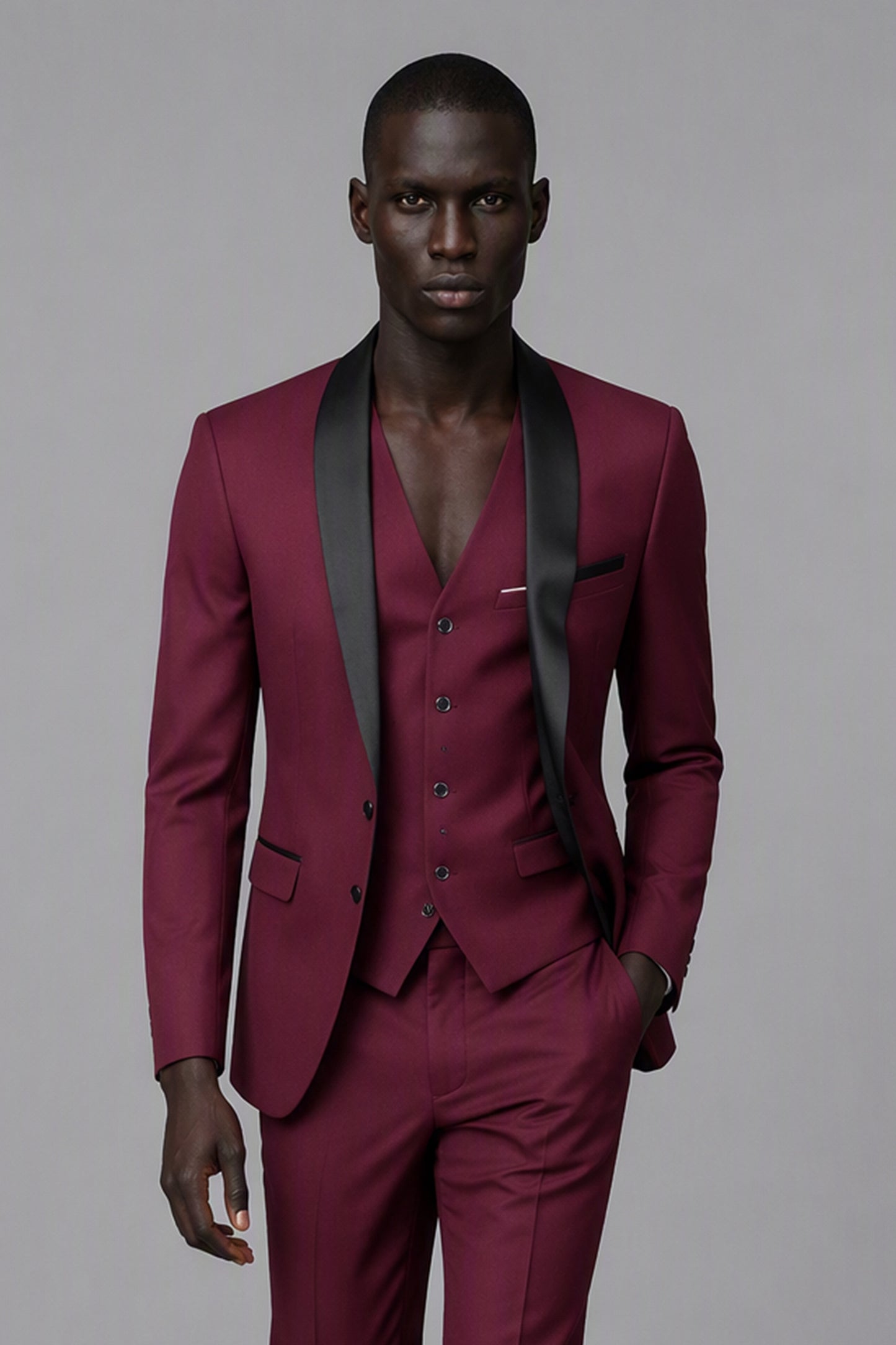 Savile Burgundy 3-Piece Tuxedo Set – Full front walking view showing natural drape, burgundy jacket and vest with tapered trouser break and black oxford shoes