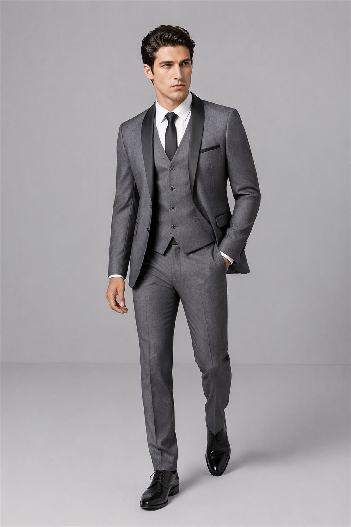 Savile Grey 3-Piece Tuxedo Set – Half-body front close-up showing charcoal grey wool-blend jacket, black satin shawl lapel, grey vest with black buttons and black shirt styling