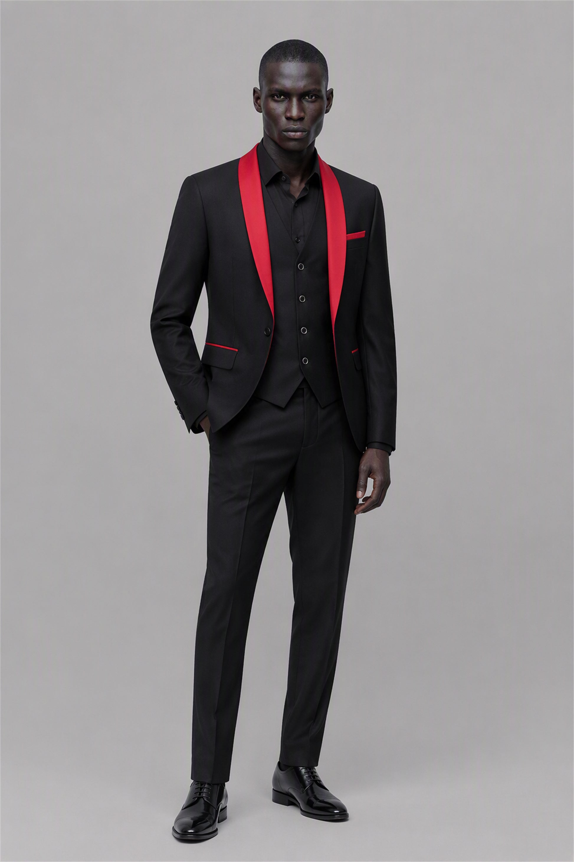 Savile Black & Red 3-Piece Tuxedo Set – Full front walking view showing complete look with black jacket, red satin shawl lapel, black vest and black trousers