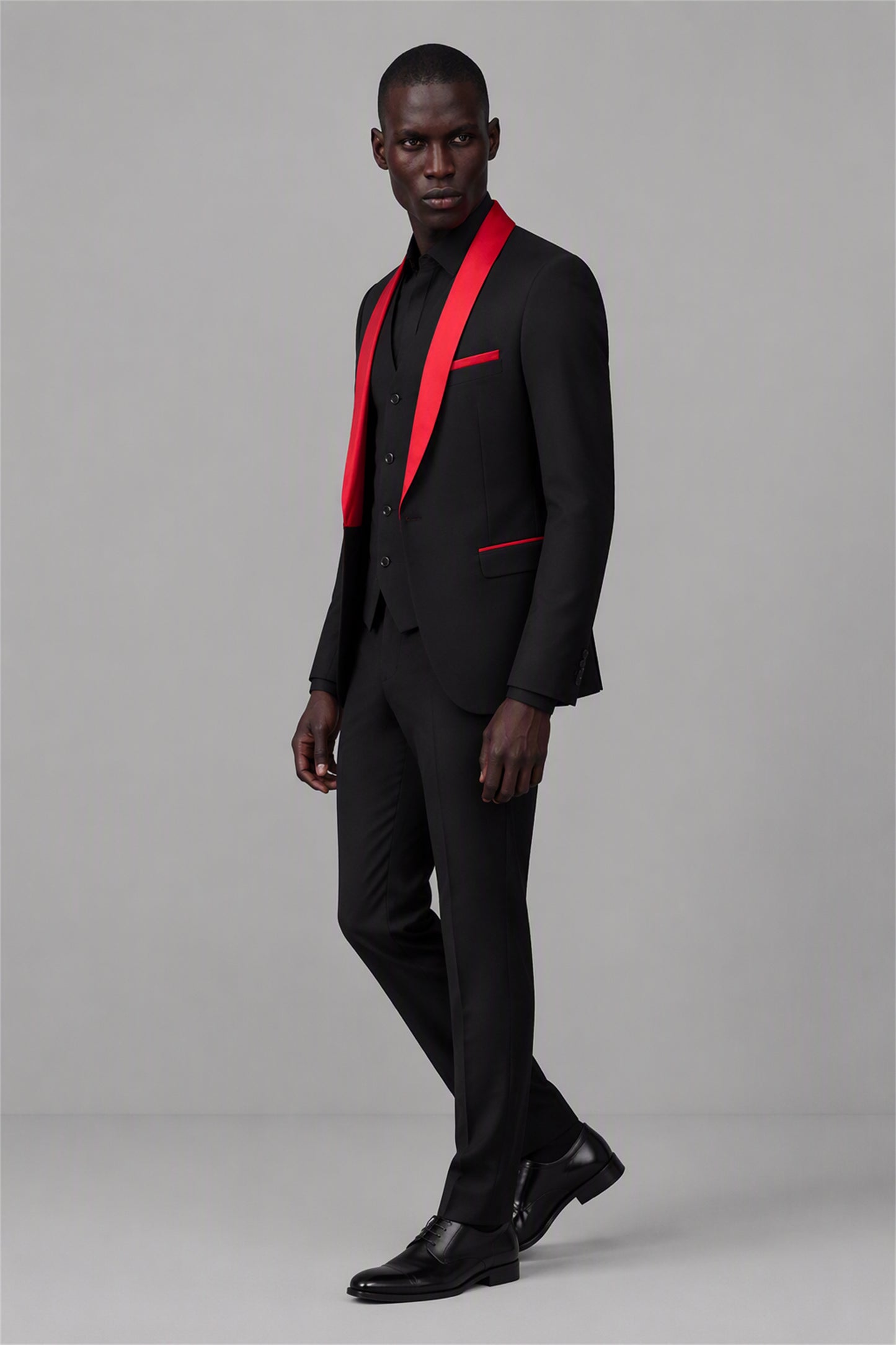 Savile Black & Red 3-Piece Tuxedo Set – Full front standing view with black shirt showing slim-fit silhouette, red shawl lapel contrast and vest layering