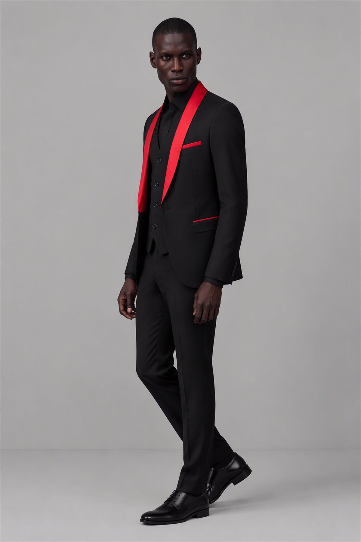 Savile Black & Red 3-Piece Tuxedo Set – Full front standing view with black shirt showing slim-fit silhouette, red shawl lapel contrast and vest layering