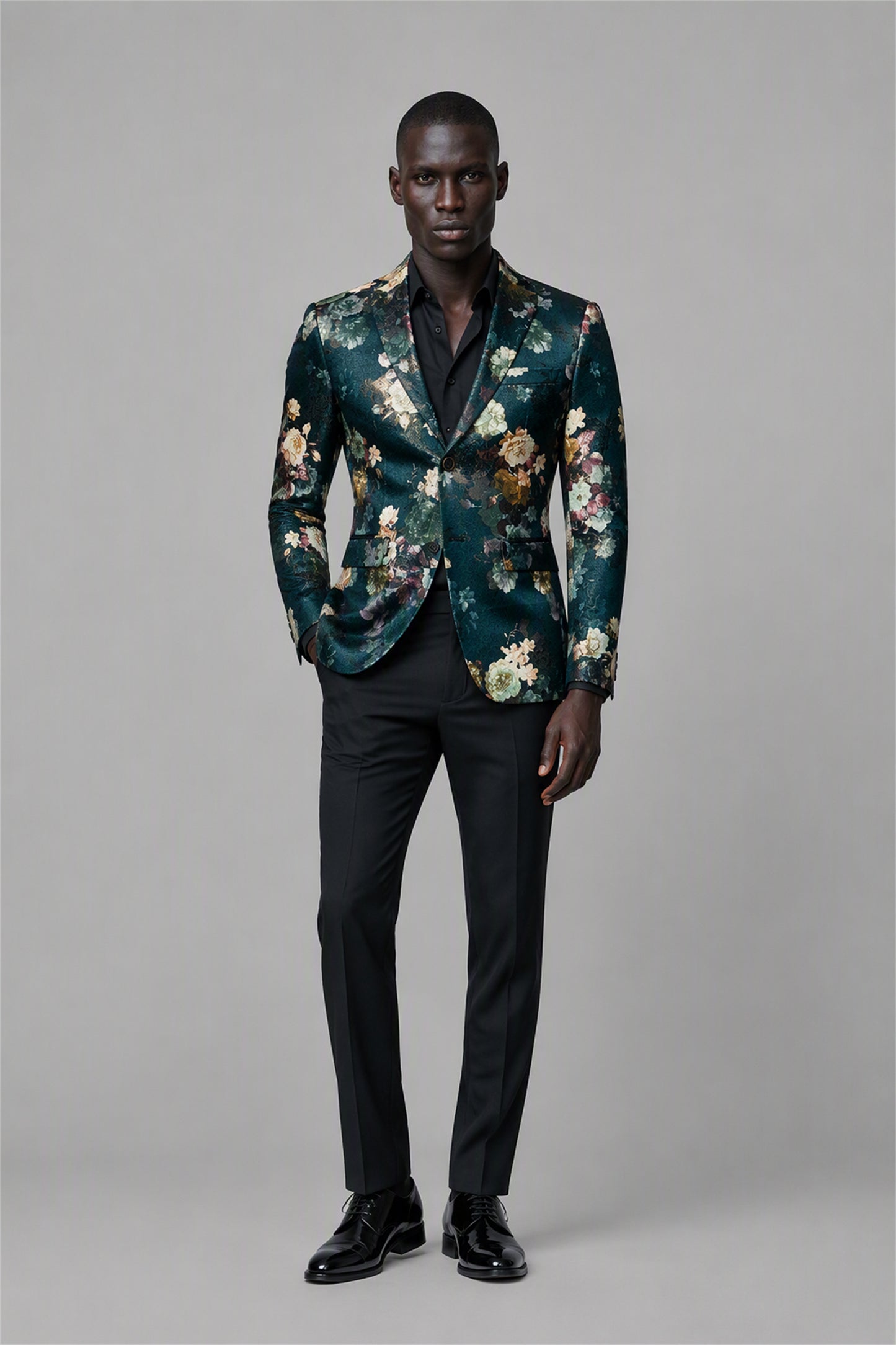 Savile Emerald Green Floral Jacquard Blazer – Full front standing view with black open-collar shirt showing slim-fit silhouette and all-over botanical floral jacquard pattern
