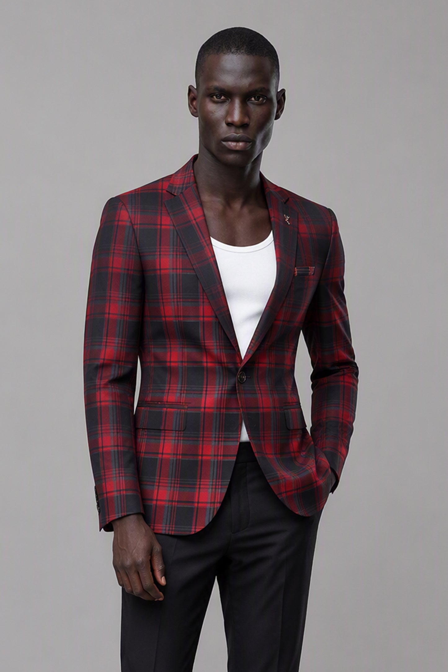 Savile Red & Black Plaid Blazer – Full rear side view with white tee showing red black plaid jacket back, sleeve button detail and tapered trouser fit