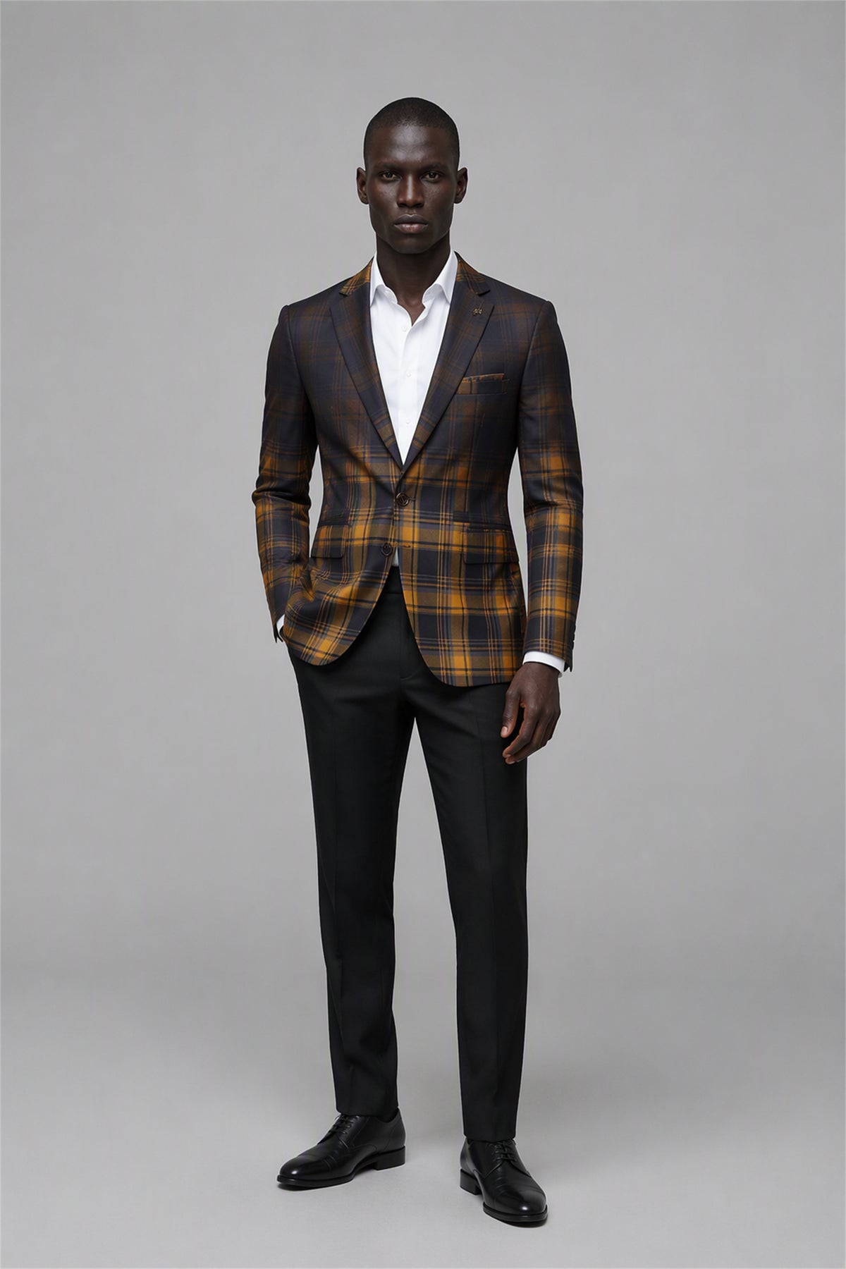 Savile Amber Gold & Navy Tartan Blazer – Full rear three-quarter view showing gold navy tartan back construction, structured shoulders and tapered black trouser fit