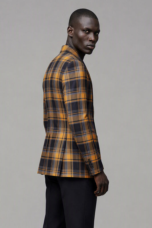 Savile Amber Gold & Navy Tartan Blazer – Full rear side profile view showing amber gold plaid jacket back, sleeve button detail and tapered black trouser fit