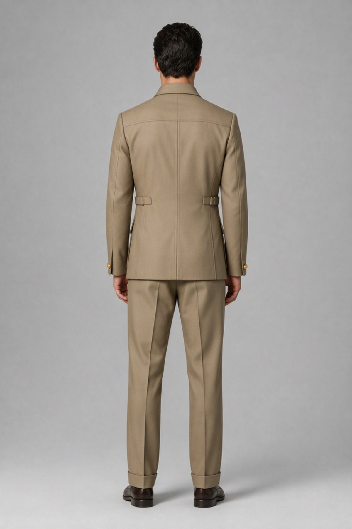 Close-up of khaki safari jacket with button front and flap pockets