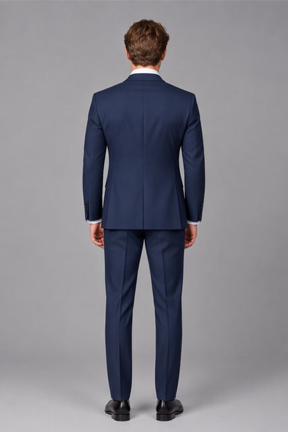 Rear back view of Savile navy blue suit jacket and trousers showing tailored fit
