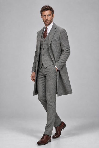 Full-length side view of Savile Men's Silver Grey 3-Piece Suit Set showing open overcoat drape and slim-fit trousers